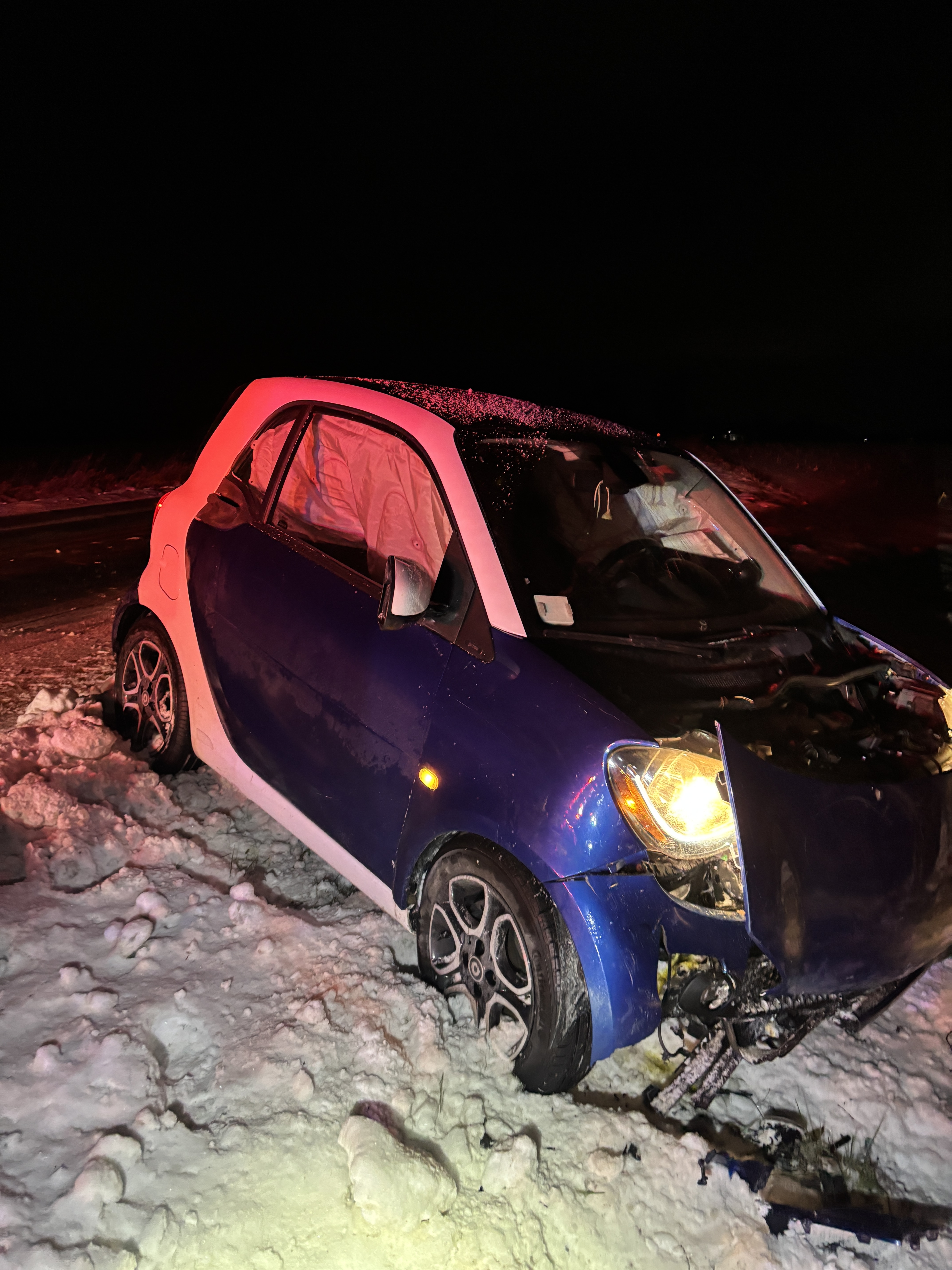 ICY ROADS SEND SMART CAR INTO TREE; EDGERTON WOMAN INJURED