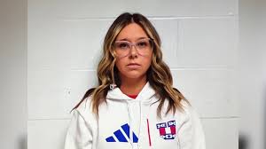 High School Secretary Arrested on Child Seduction Charges After Police Investigation