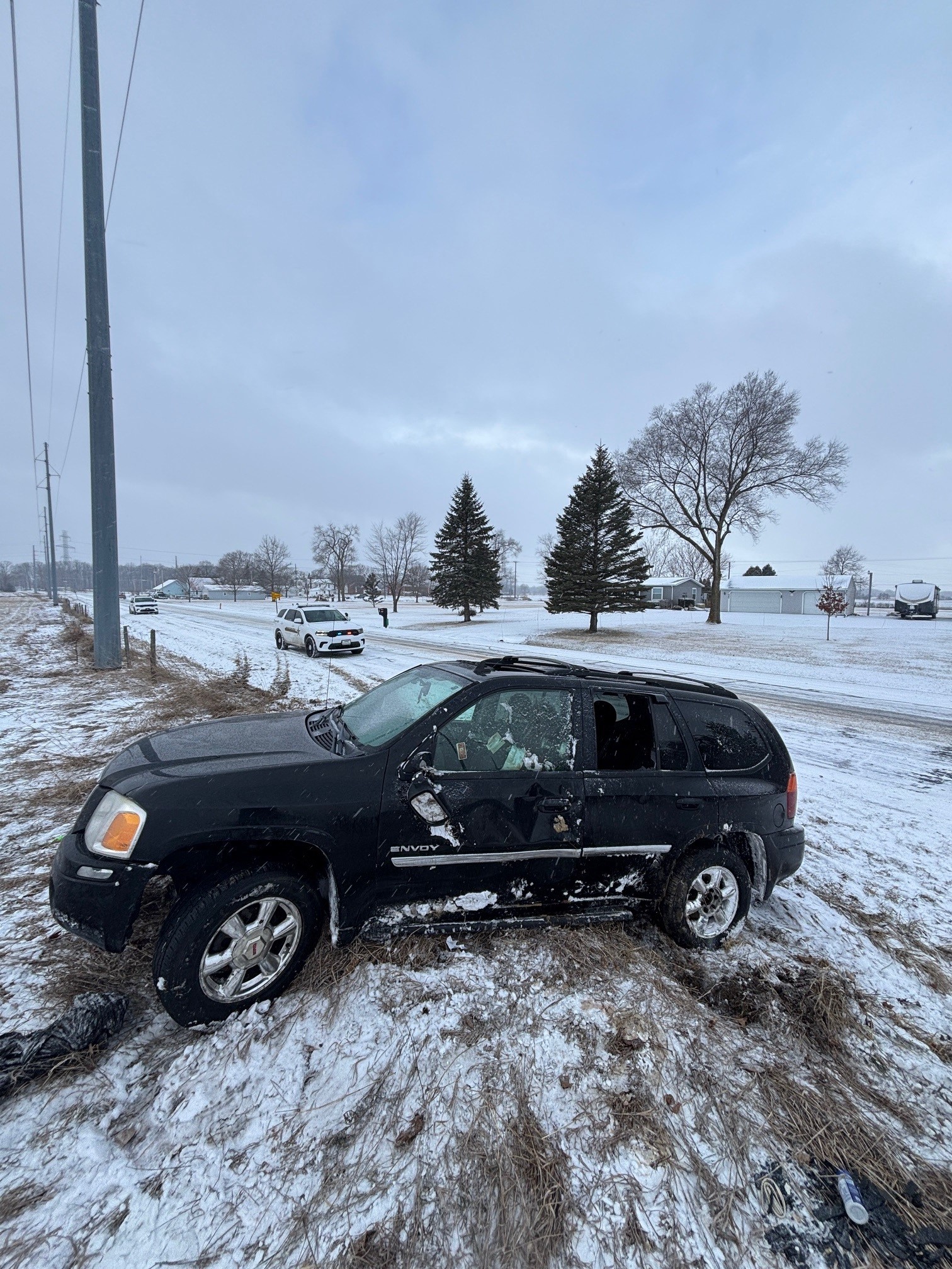 Passenger Injured After SUV Crashes Into Ditch On Snowy Road